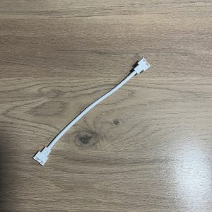 RGBW COB Clip on Corner. Used to connect two 12mm RGBW COB strips together to go round corners without soldering